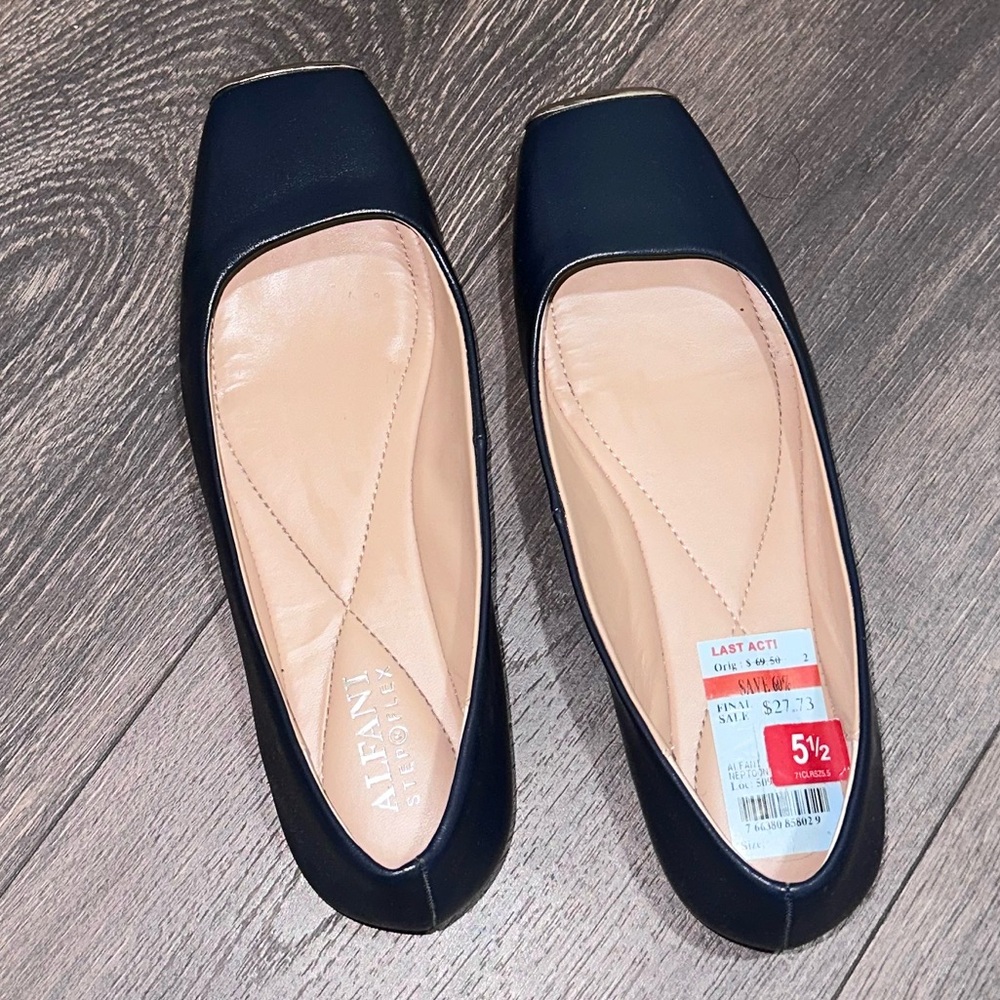 Navy blue flats with gold detailing